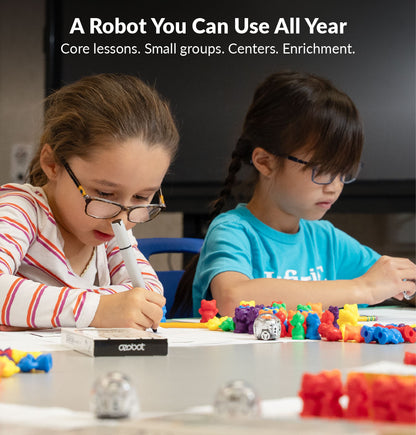 Students coding an Ozobot Evo educational robot to build critical thinking and AI-ready skills all school year